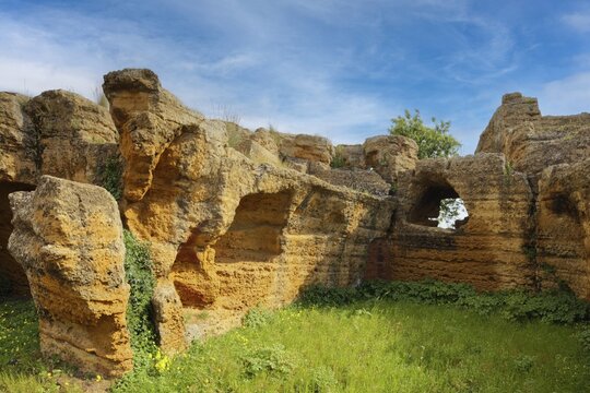 Relics of ancient rock tombs, Arcosol tombs (Arcosolia), Valley of the Temples, Valle dei Templi, near Agrigento, Sicily, Italy, Mediterranean Sea