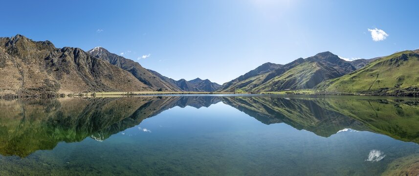 Panorama, mountains reflecting in lake, Moke Lake near Queenstown, Otago Region, Southland, New Zealand