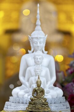 Golden Buddha (Dhyana-mudra: gesture of meditation), behind him five seated Buddhas (path to enlightenment), Buddhist temple complex Wat Phra That Sorn Kaew, Phetchabun province, Isan, Thailand