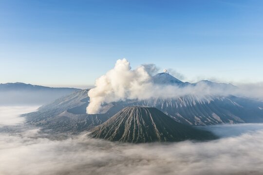 Mount Bromo smoking volcano, Mount Batok, Mount Kursi, Mount Gunung Semeru, Bromo Tengger Semeru National Park, East Java, Indonesia