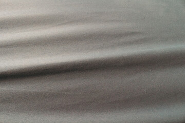 Obraz premium Smooth Gray Satin Fabric Texture with Elegant Flowing Folds, Luxury Silk Cloth Background