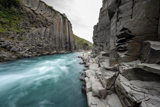 Stu&eth;lagil Canyon, turquoise river between basalt columns, Egilsstadir, Iceland