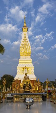 Chedi decorated with golden ornaments at Wat Phra That Phanom at sunrise, temple complex in Amphoe That Phanom, Nakhon Phanom Province, Isan, Thailand