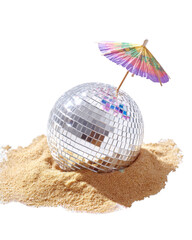Mirror disco ball on sand with colorful paper cocktail umbrella summer party concept