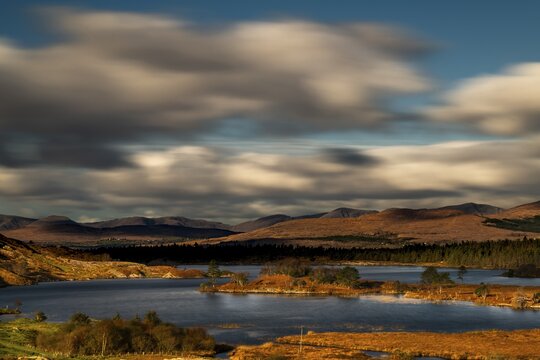 Lough Cloonee with cloudy sky in autumn landscape, Kenmare, County Kerry, Ireland