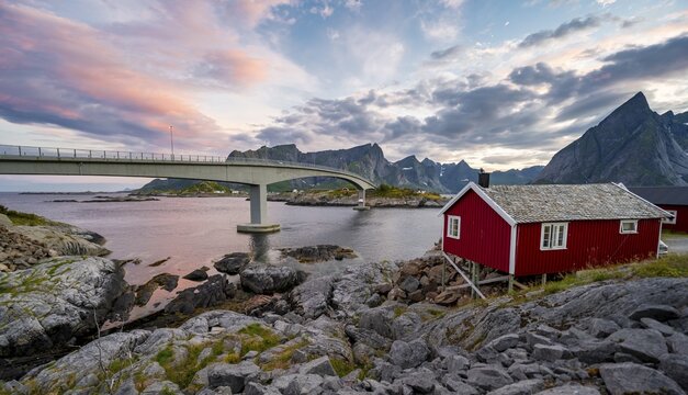 Traditional red stilt houses, typical fishing hut with bridge, Reine, Lofoten, Nordland, Norway