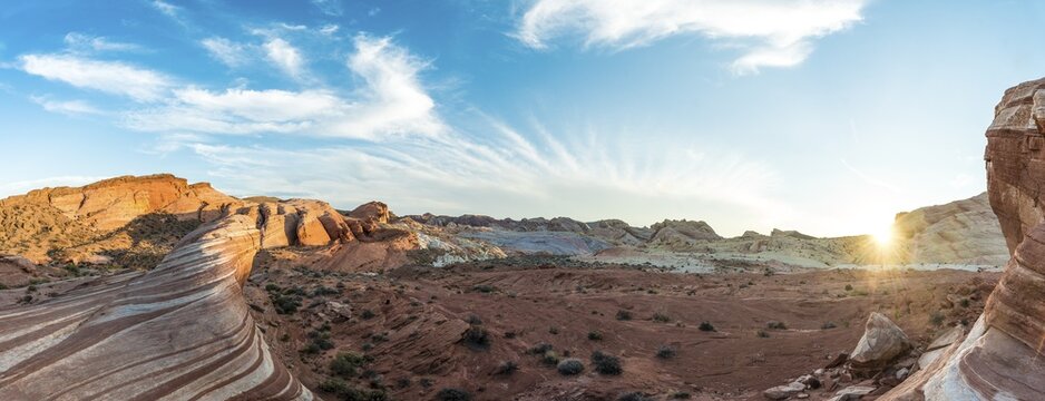 Fire Wave sandstone formation in evening light, behind Sleeping Lizard rock formation, Valley of Fire State Park, Nevada, USA