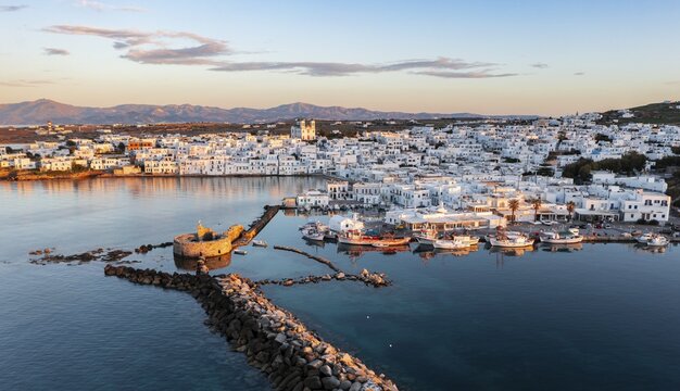 Evening atmosphere, aerial view, town view and harbour of Naoussa, harbour wall with Venetian ruins, Paros, Cyclades, Greece