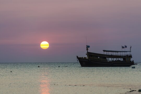 Diving boat in sea at sunset, Koh Tao Island, Gulf of Thailand, Thailand