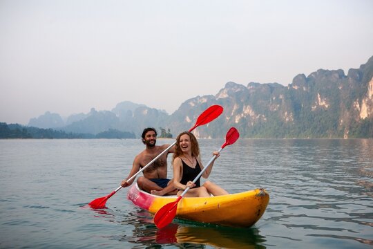 Couple kayaking scenic lake
