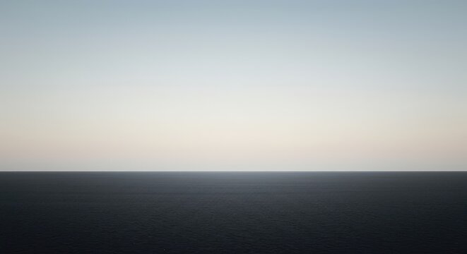 Minimalist view of a calm, empty landscape bathed in soft light. Perfect stillness and silent peace on the horizon, balance, absolute stillness, potential