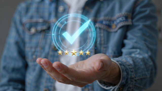 Hand holding glowing checkmark and stars