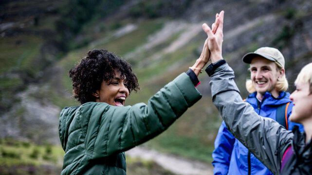Joyful hikers celebrating outdoor adventure