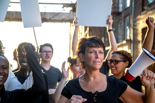 Diverse group protesting together passionately