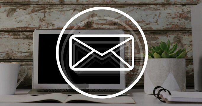 Vertical video: laptop getting email ping, envelope icon pulsing over screen, aiding business flow