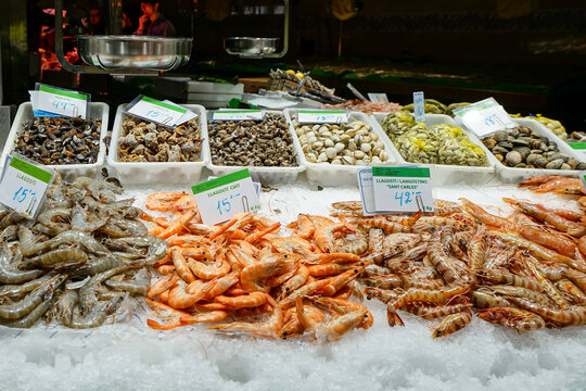 Barcelona,Spain,Fresh seafood displayed on ice at a market stall with price tags