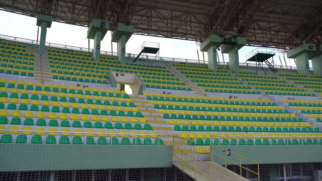 View of green and yellow seats at Sanliurfa Stadium