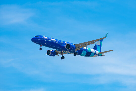 JetBlue Airbus 321-200 neo N2188J, with Mint Leaves livery, landing on Boston Logan International Airport, Boston, Massachusetts MA, USA. 