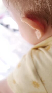 Baby Plays Unsupervised Near Toddler Pool in summer - Vertical
