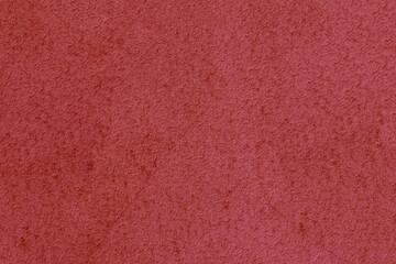 Fototapeta premium A grey wall with a few spots on it