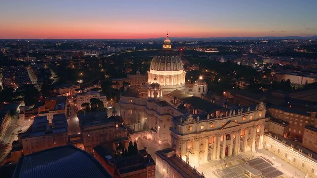 Aerial city view St. Peter's basilica in Rome, aerial shot at sunset with drone. San Pietro, Roma. 