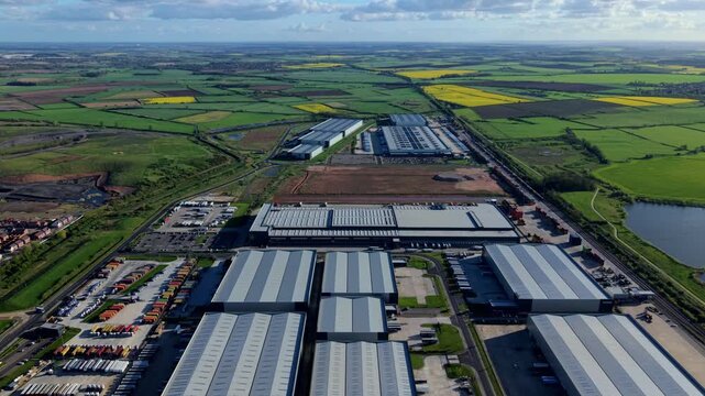 Aerial drone view of massive global supply chain fulfillment centers at iPort logistics park Doncaster