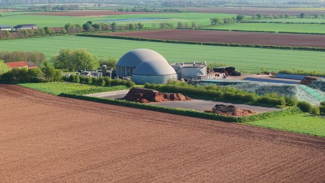 Aerial view of a biogas renewable energy plant with domes in the Lincolnshire countryside UK