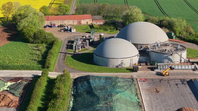 Aerial view of a biogas renewable energy plant with domes in the Lincolnshire countryside UK
