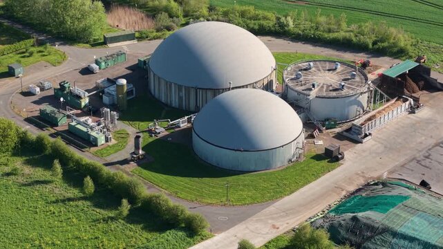 Aerial view of a biogas renewable energy plant with domes in the Lincolnshire countryside UK