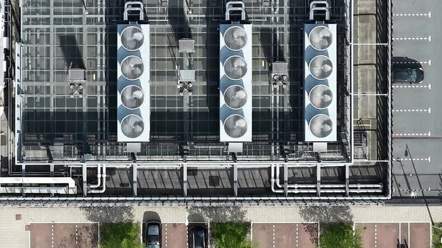 Aerial top down view of rooftop hvac system and parking lot