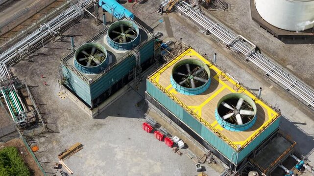 Aerial close up of rotating industrial turbine fans at major  chemical park in Saltend UK
