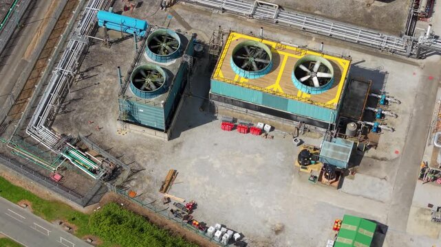 Aerial close up of rotating industrial turbine fans at major  chemical park in Saltend UK