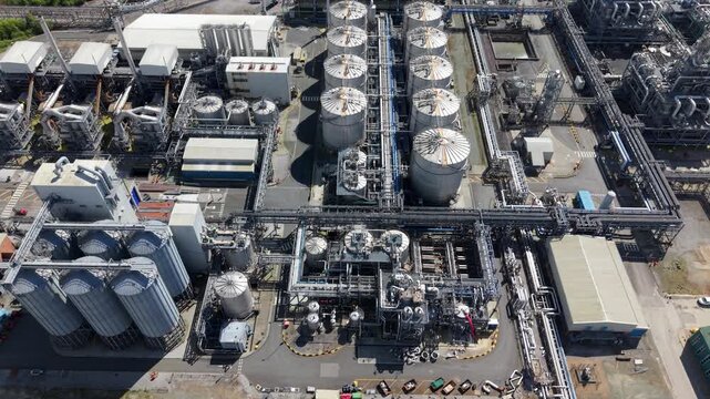 Aerial view of industrial silos and chemical production storage tanks at Saltend Chemicals Park Hull UK