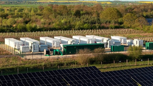 Close up aerial view of battery energy storage systems BESS units near a solar farm in Tiln Retford UK
