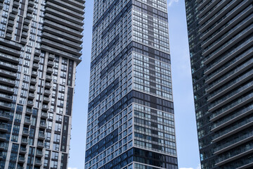 Modern residential high rise apartment buildings in urban city skyline. © Erman Gunes