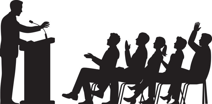 Silhouette of a man speaking at a podium to an audience