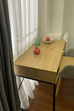 granat on the table near a window