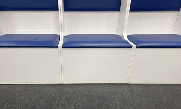 empty locker room for hockey team in ice stadium