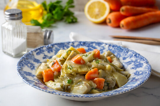 Traditional Turkish Braised Artichoke (Enginar) with Potatoes and Carrots in Olive Oil