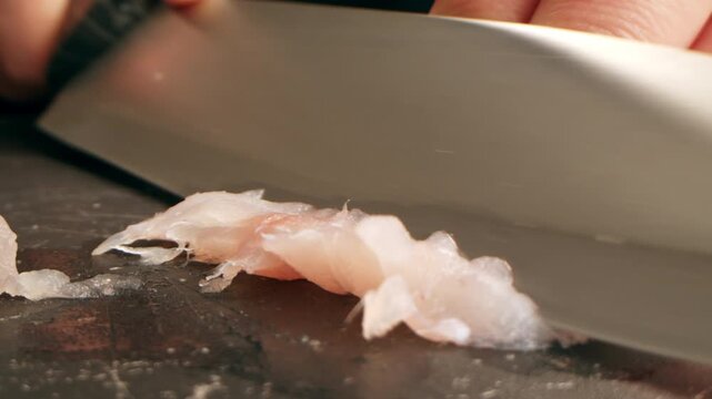 Cooking fish Peruvian ceviche close-up. Fresh cooked ceviche made of raw white fish. Traditional Peruvian cuisine. Cooking seafood dish.