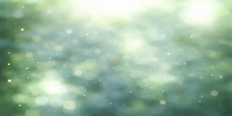 A bright winter design features falling snowflakes and a glowing star pattern over a green and blue abstract bokeh background with a cold holiday light texture © Kazim