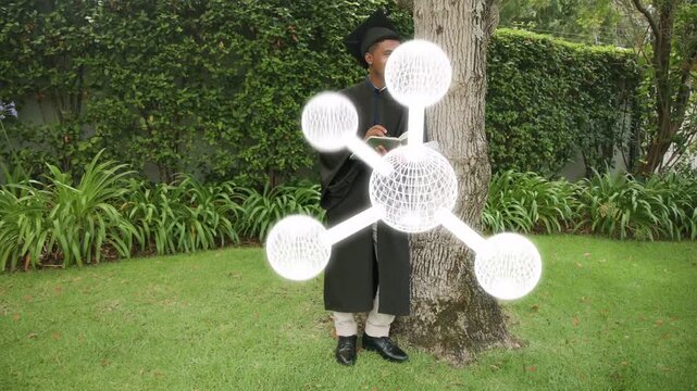 Graduate leaning by tree opening book, writing while molecule overlay rotating obscuring for grad