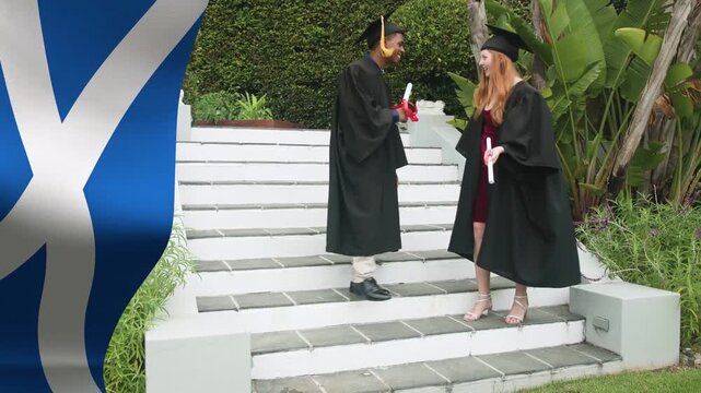 Man and woman graduates descending steps holding diplomas pausing shaking hands for education
