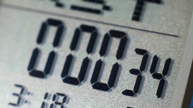 Digital timer and stopwatch running on a digital watch lcd display