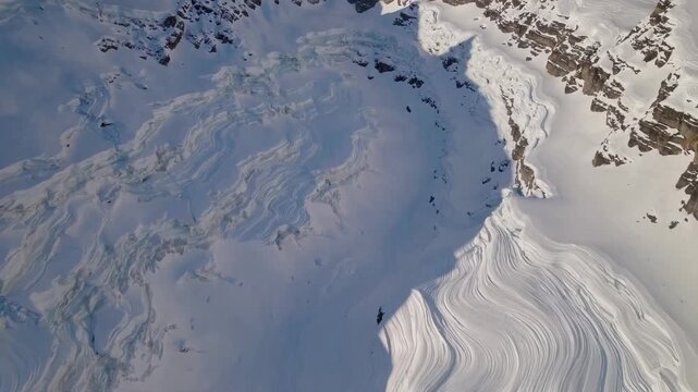 Ice formations seen. Scientists and filmmakers study detailed ice structures from sky above. Observers analyze complex ice formations from aerial perspectives to understand natural freeze patterns
