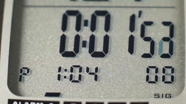 Digital timer and stopwatch running on a digital watch lcd display