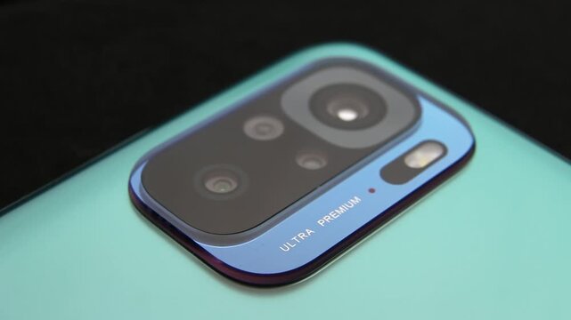 Macro close up of a smartphone camera lens on back
