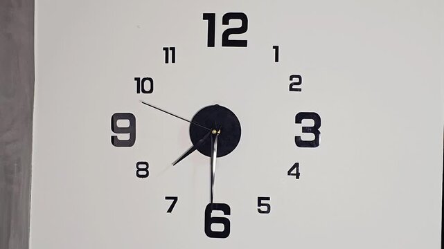 Wall clock showing the hours.