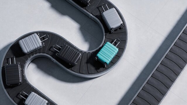 A close-up view of a luggage conveyor belt with various suitcases. The scene includes a teal suitcase among black and gray ones, showcasing travel and transportation.