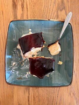 Top view of delicious cake slices served on a ceramic plate